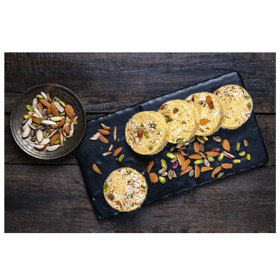 Shop Bhagat's Orange Sonrolls from Shree Heera Sweets 250 gms online at best prices on The State Plate